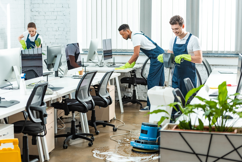 janitorial crew cleaning an office