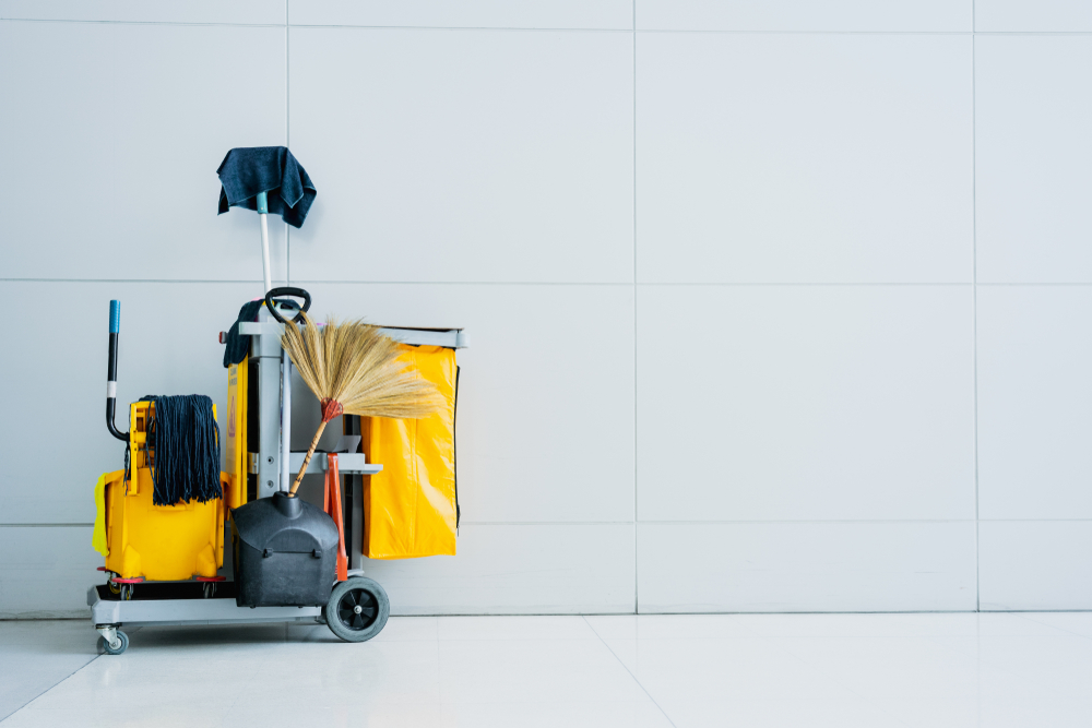 janitorial cart with cleaning supplies